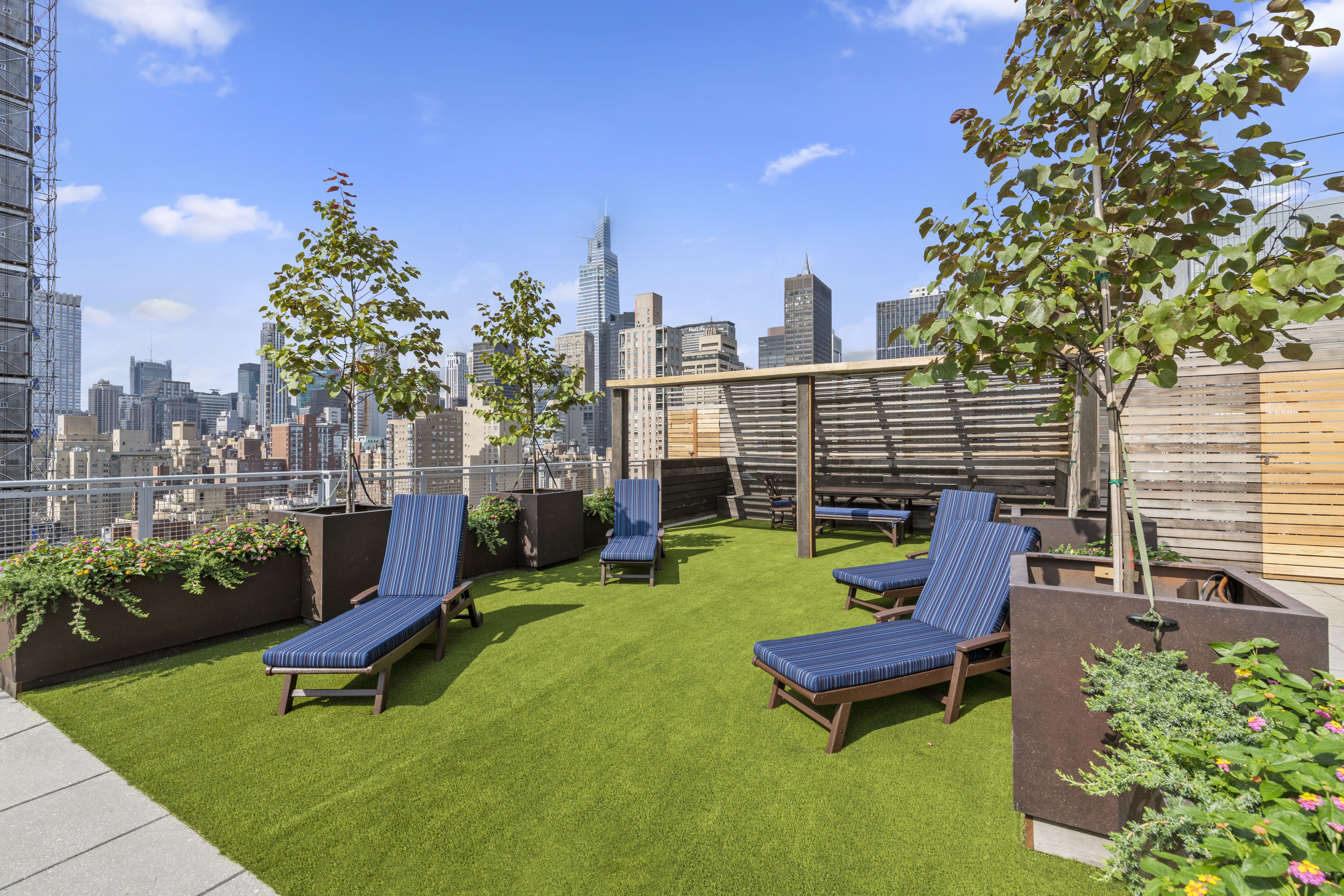 225 East 34th Street, Unit 17B Manhattan, NY 10016 - Photo 20 of 24 a view of a chairs in backyard of the house