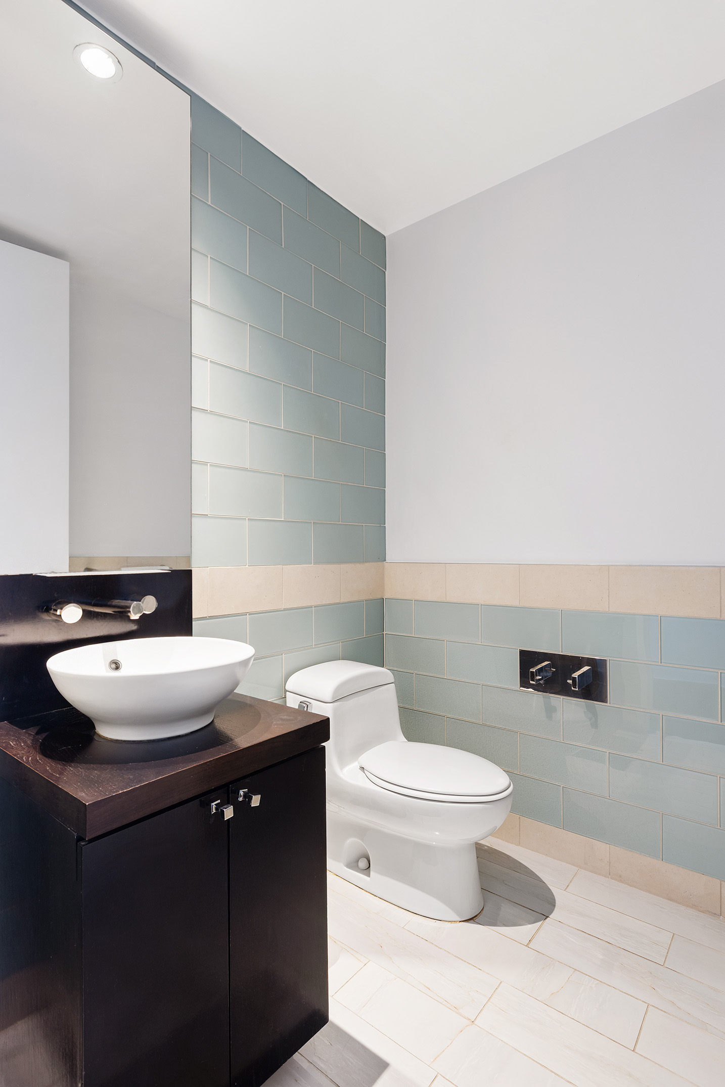 450 East 83rd Street, Unit 8B Manhattan, NY 10028 - Photo 14 of 22 a bathroom with a sink and a toilet