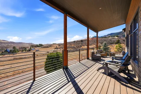 a view of roof deck with patio