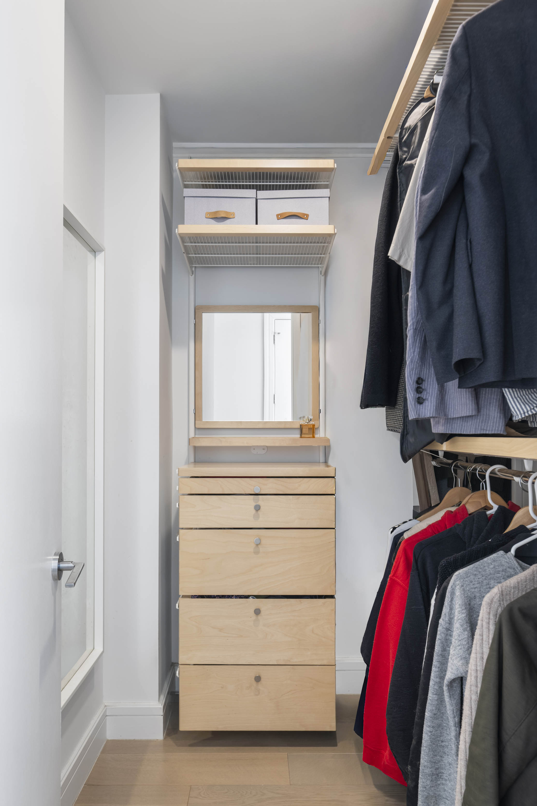 695 6th Avenue, Unit 2P Brooklyn, NY 11215 - Photo 5 of 15 a view of walk in closet with clothes and shoes