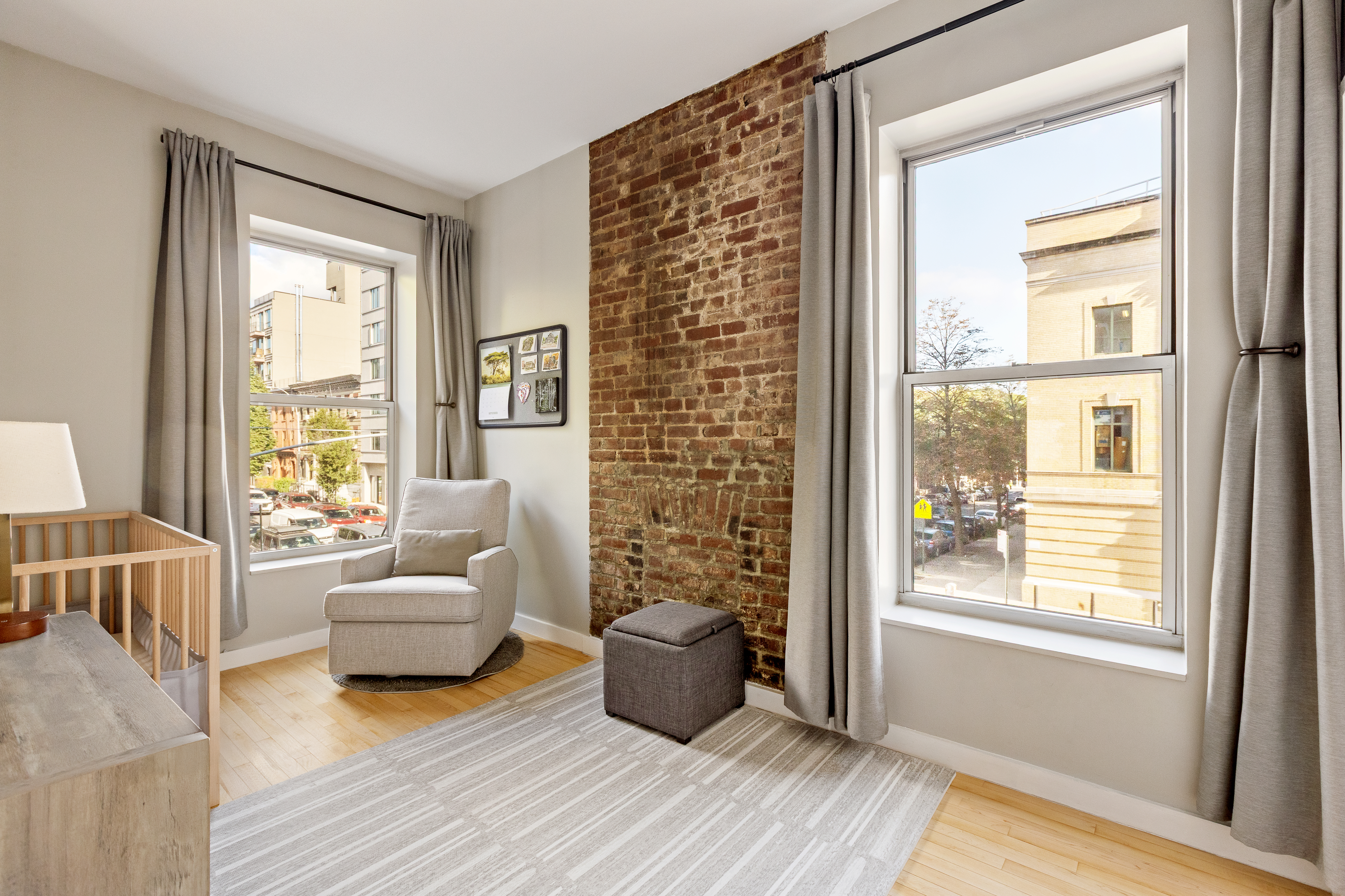 524 St Johns Place, Unit 2A Brooklyn, NY 11238 - Photo 5 of 8 a living room with furniture and a window