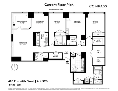 a black and white photo of a book and a white bed