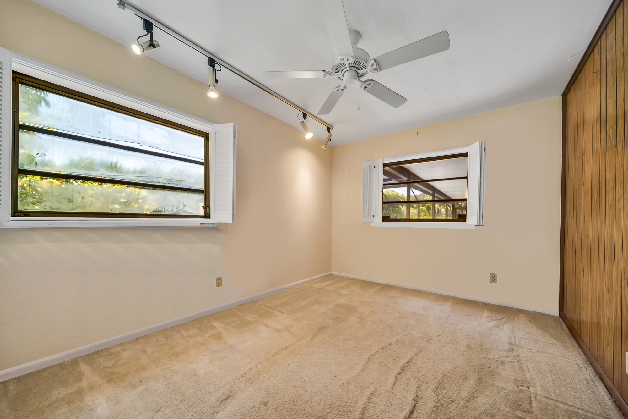 6760 Southwest 62nd Terrace Miami, FL 33143 - Photo 13 of 38 a view of an empty room with a window