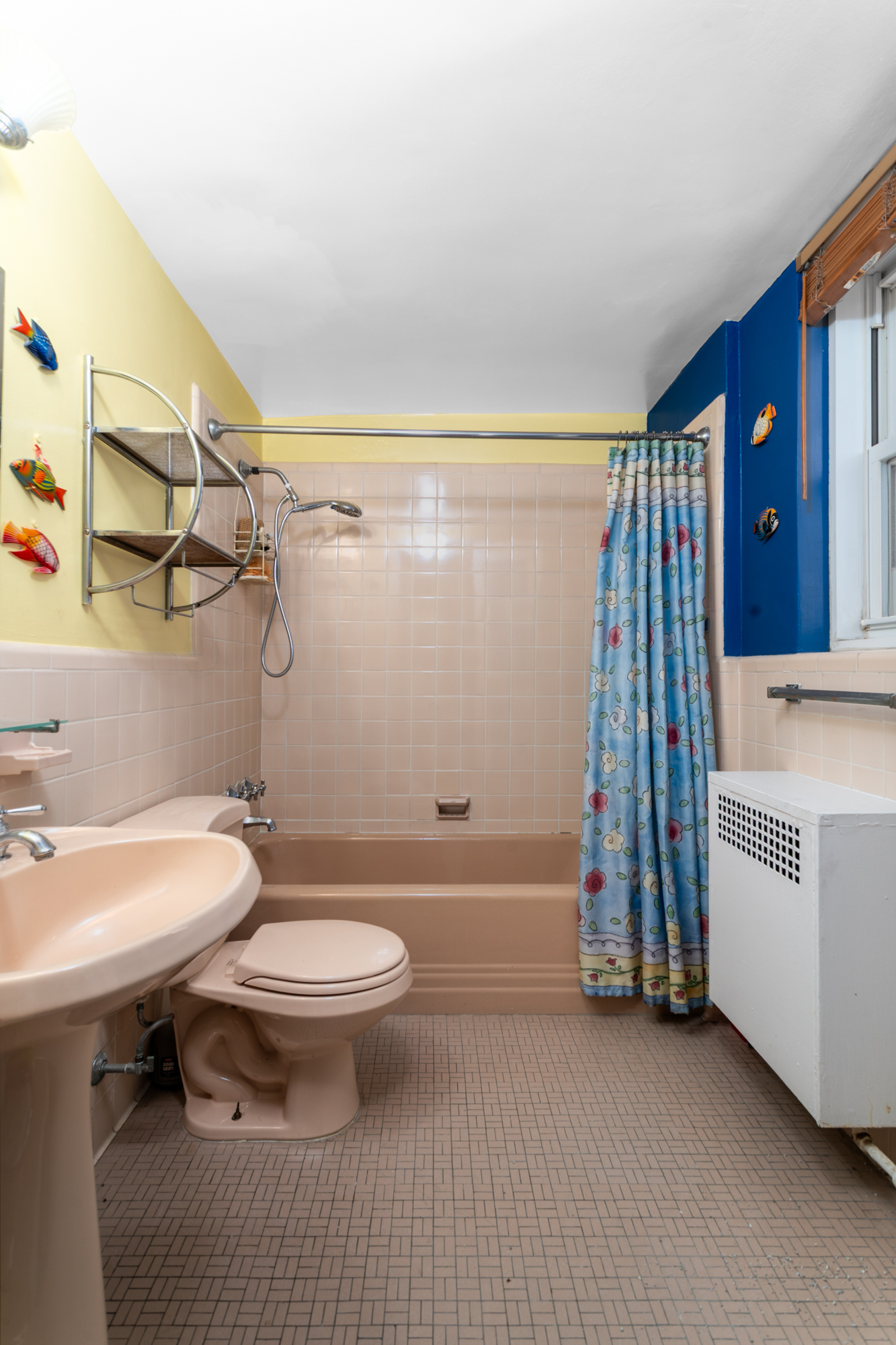 180 Cabrini Boulevard, Unit 61 Manhattan, NY 10033 - Photo 10 of 33 a bathroom with a sink a toilet and shower