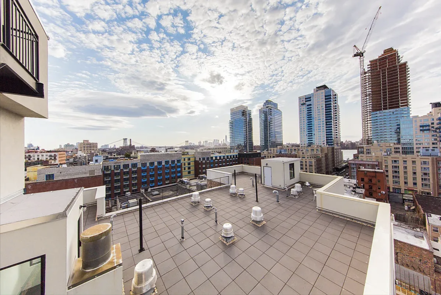 65 North 6th Street, Unit 3D Brooklyn, NY 11249 - Photo 6 of 7 a terrace with outdoor seating and city view
