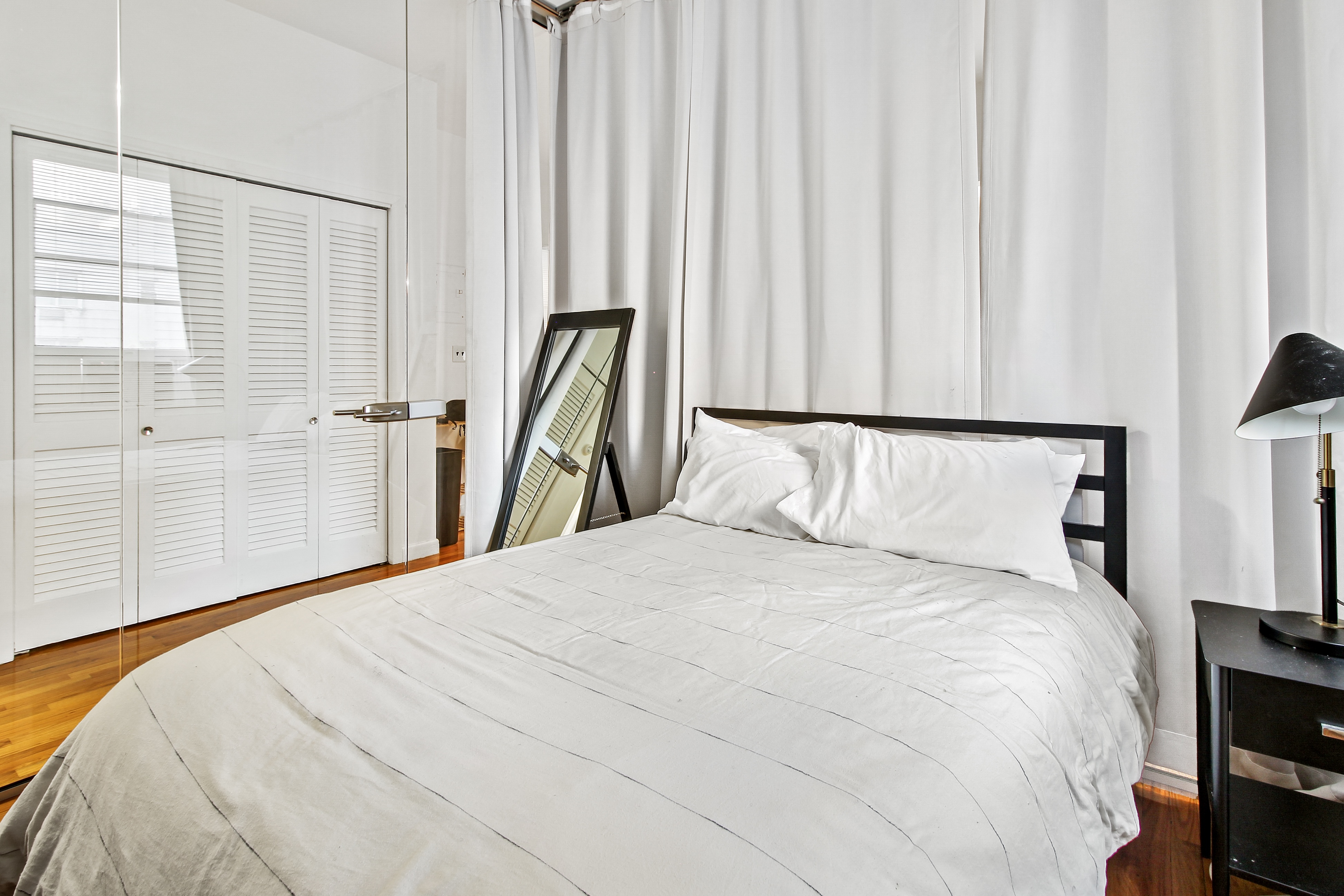 621 2nd Avenue, Unit 2 Manhattan, NY 10016 - Photo 6 of 8 a large white bed in a white room