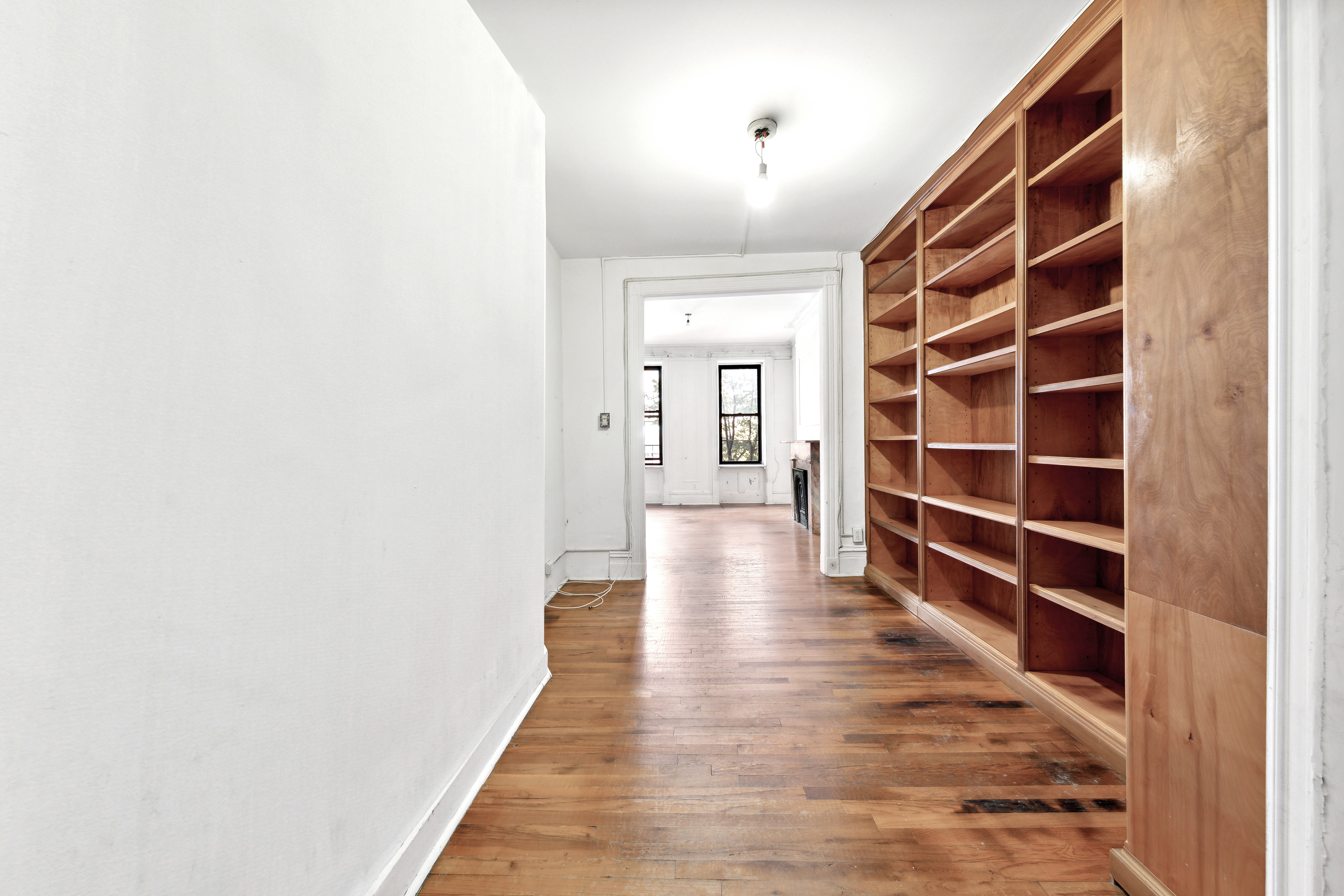 206 East 90th Street, Unit 2E Manhattan, NY 10128 - Photo 4 of 13 a view of walk in closet with empty racks