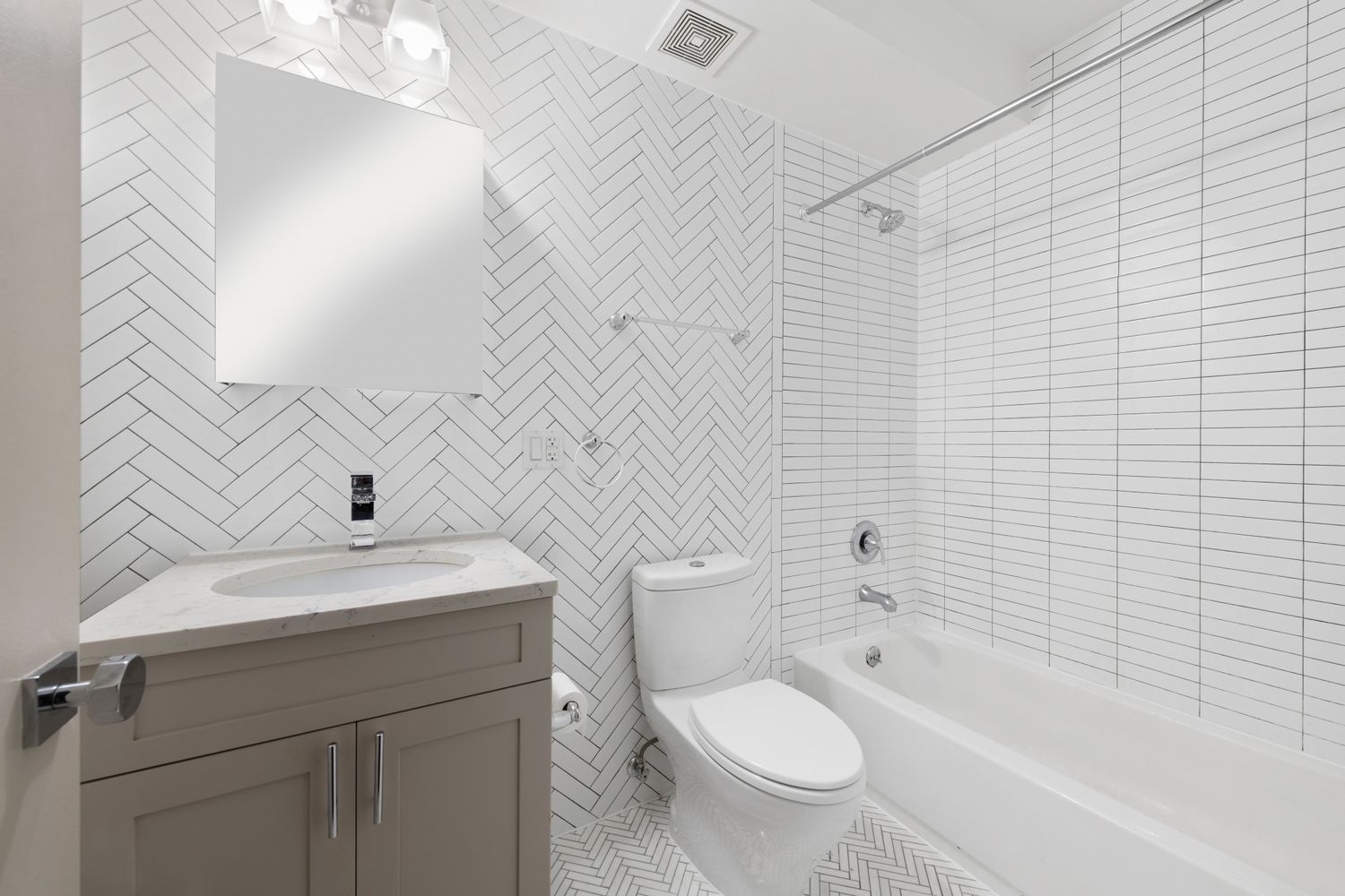 51 West 11th Street, Unit 3R Manhattan, NY 10011 - Photo 5 of 5 a bathroom with a sink a toilet and bathtub