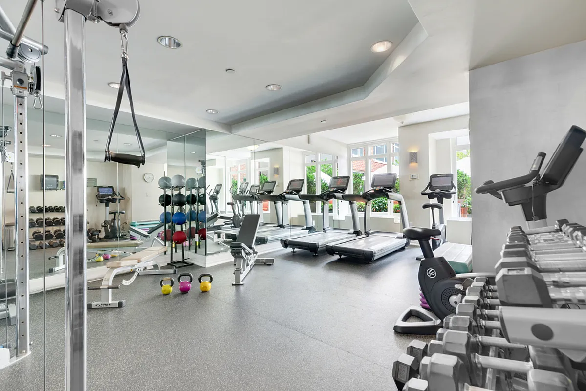 205 East 85th Street, Unit 16H Manhattan, NY 10028 - Photo 12 of 14 a view of a room with gym equipment