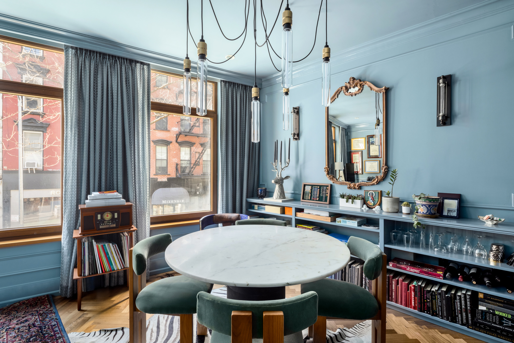 25 Prince Street, Unit 2A Manhattan, NY 10012 - Photo 4 of 11 a view of a dining room with furniture window and outside view