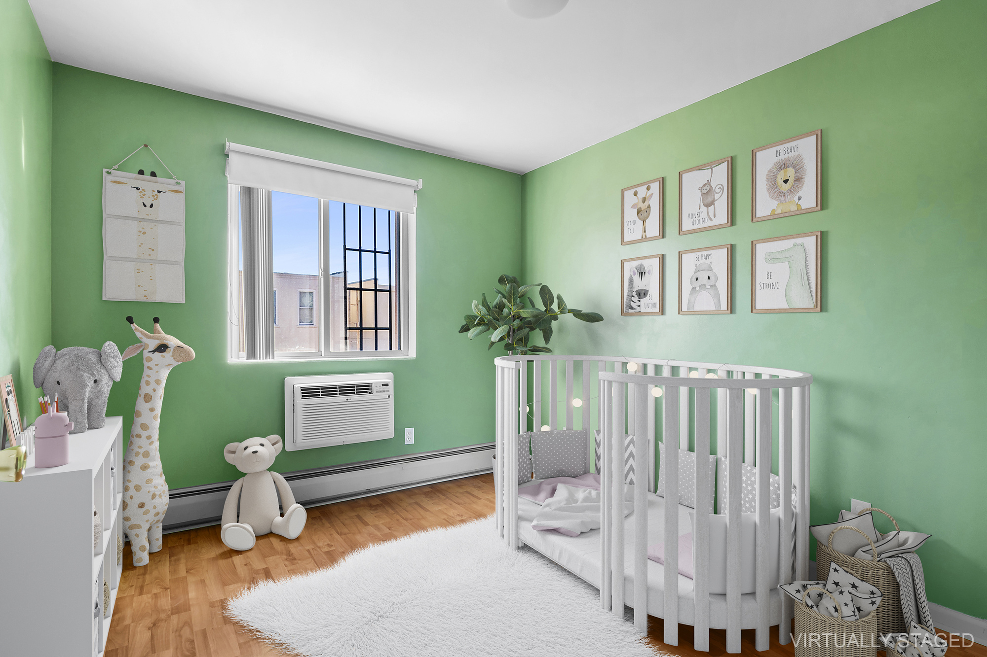 21-08 Butler Avenue, Unit J2 Queens, NY 11385 - Photo 3 of 14 a bedroom with furniture and a wooden floor