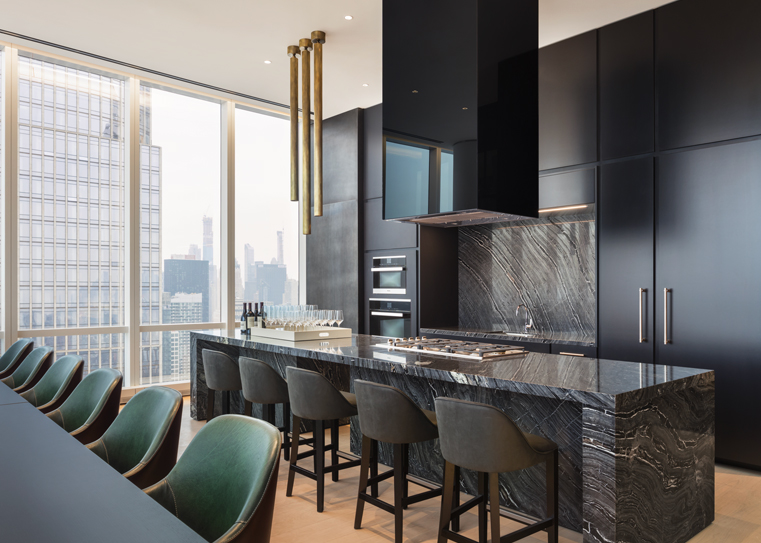 15 Hudson Yards, Unit 66F Manhattan, NY 10001 - Photo 15 of 23 a kitchen with stainless steel appliances granite countertop a sink and a refrigerator