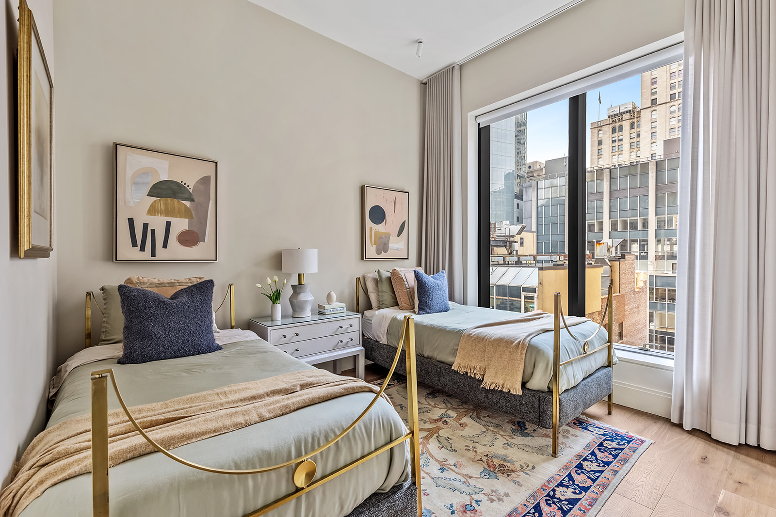 30 East 29th Street, Unit 16A Manhattan, NY 10016 - Photo 7 of 16 a bedroom with a bed and wooden floor