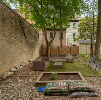 a view of yard with swimming pool