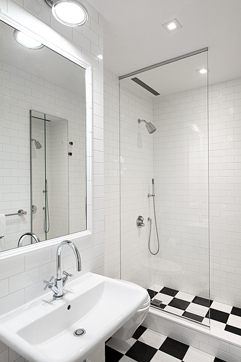 92 Laight Street, Unit 3ABC Manhattan, NY 10013 - Photo 21 of 26 a bathroom with a sink and a mirror