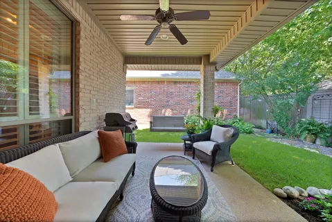 a backyard of a house with seating space