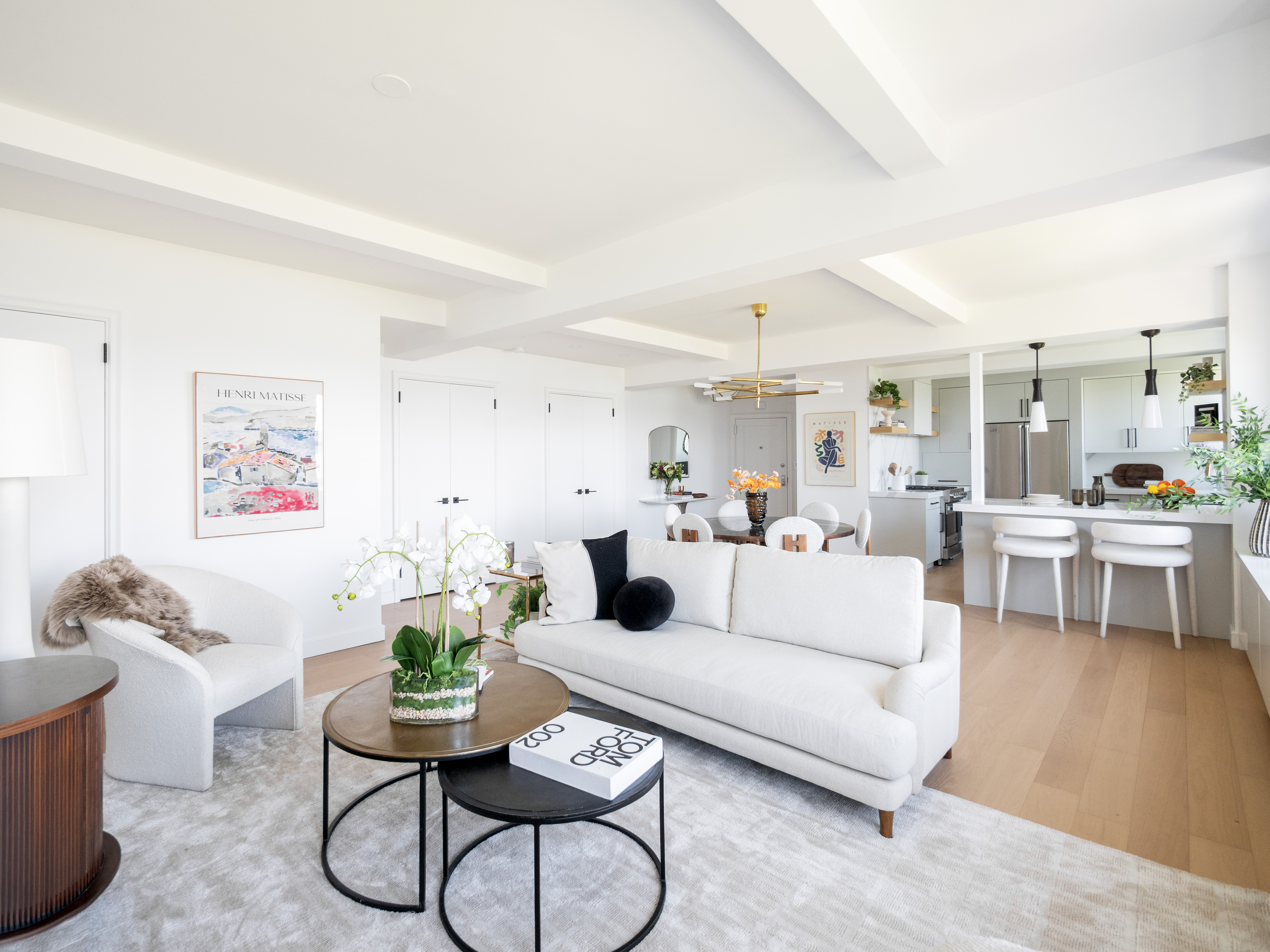 230 Riverside Drive, Unit 14AC Manhattan, NY 10025 - Photo 6 of 30 a living room with furniture and kitchen view