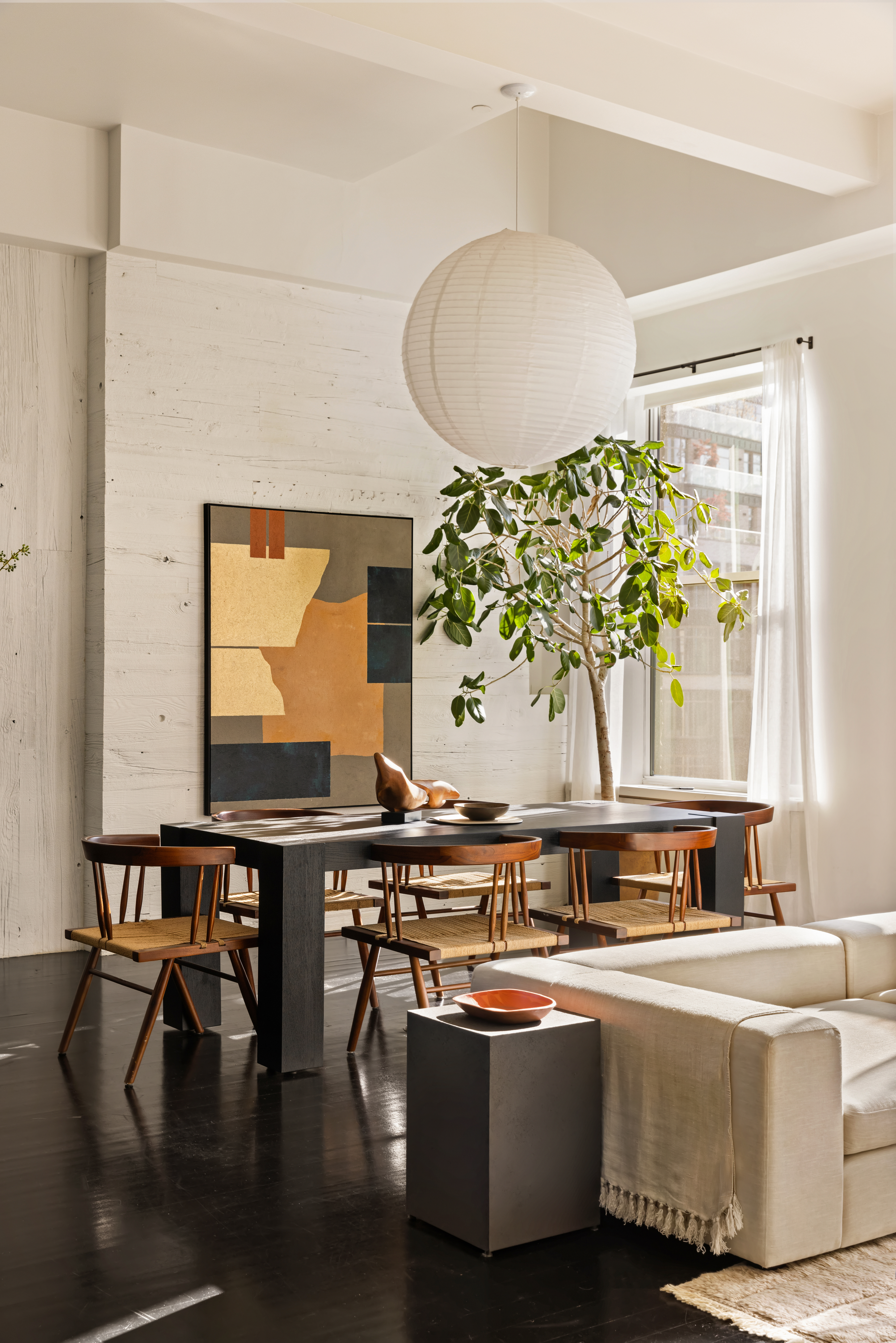 7 Bond Street, Unit PHAB Manhattan, NY 10012 - Photo 3 of 20 a living room with a table and chairs