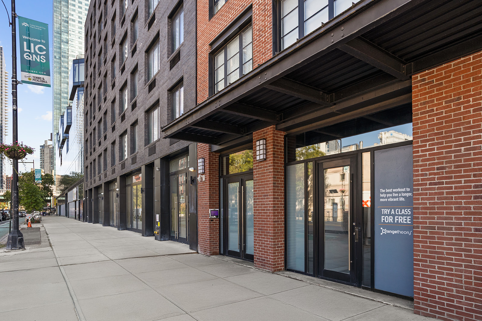 21-10 44th Drive, Unit PHA Queens, NY 11101 - Photo 17 of 18 a view of a building stairs