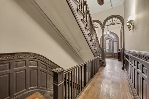 a view of entryway with a front door