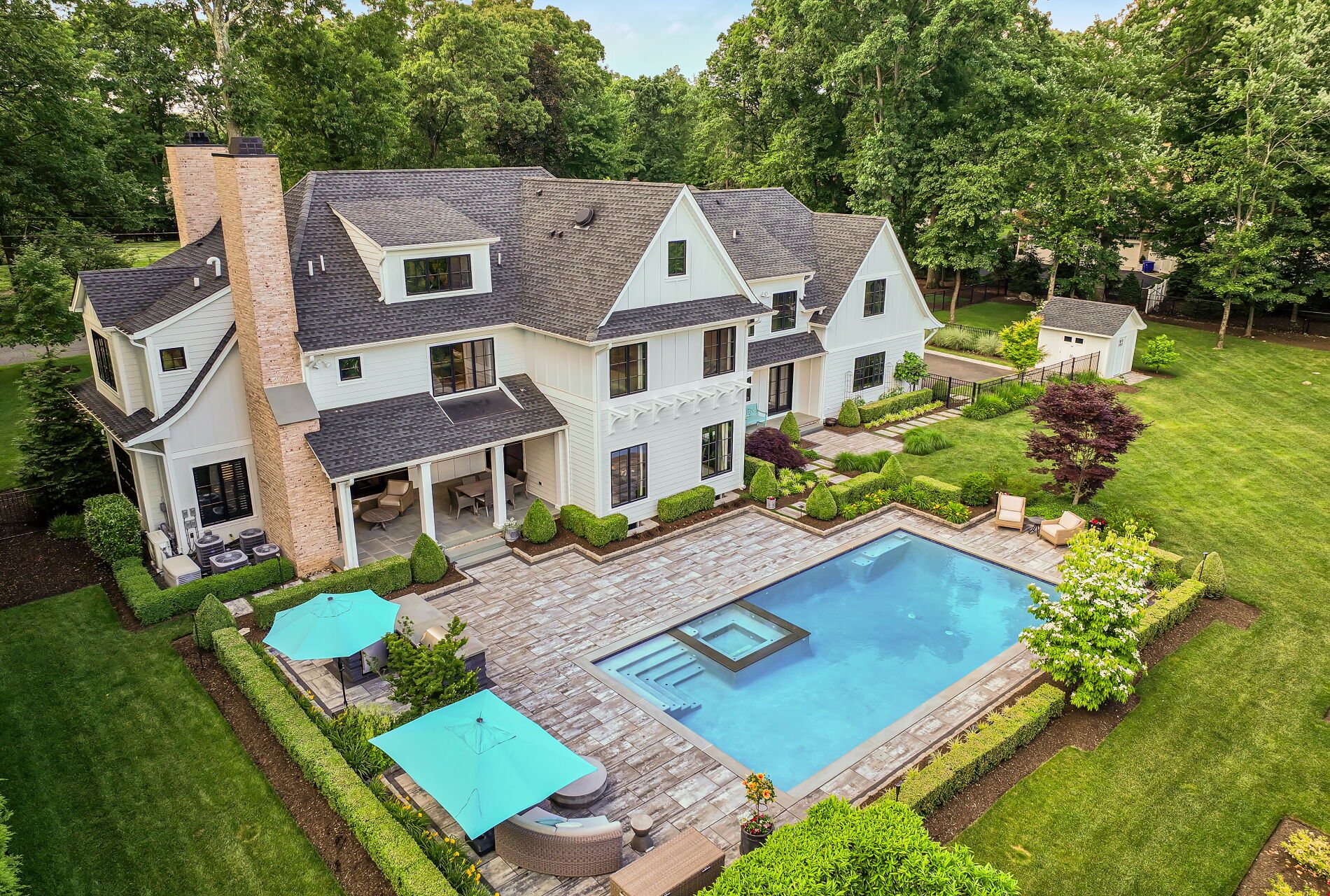 838 Seneca Road Franklin Lakes, NJ 07417 - Photo 82 of 92 an aerial view of a house with swimming pool