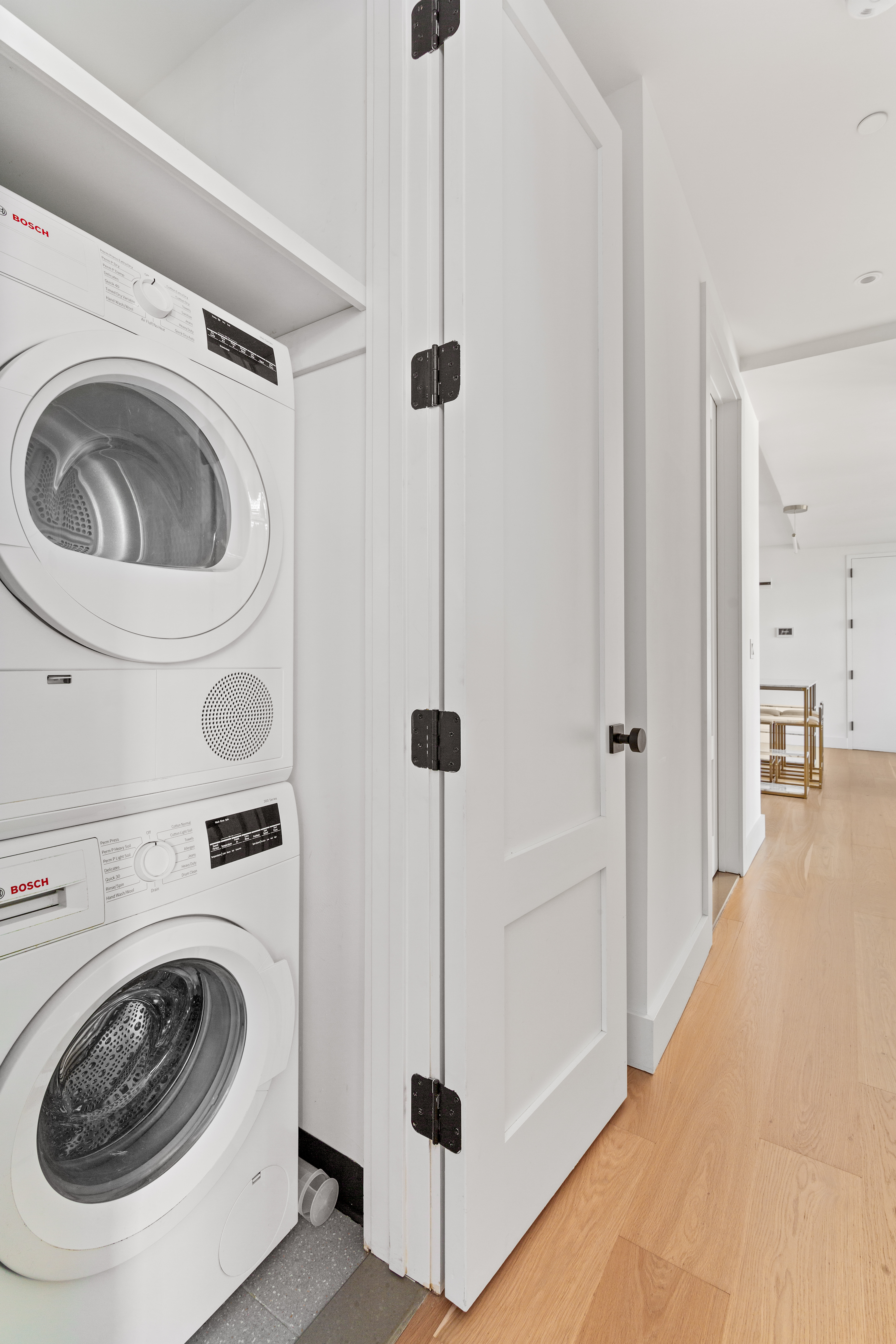 112 Fleet Place, Unit 12A Brooklyn, NY 11201 - Photo 11 of 15 a utility room with dryer and washer