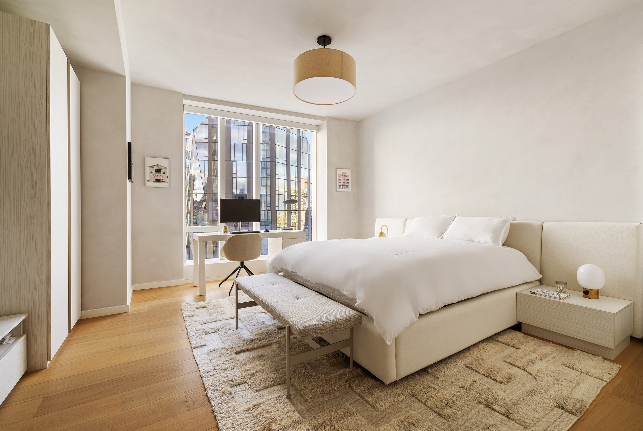 1 West End Avenue, Unit 25F Manhattan, NY 10023 - Photo 10 of 15 a bedroom with a bed and a large window