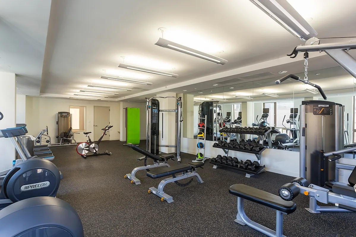 626 Flatbush Avenue, Unit 9H Brooklyn, NY 11225 - Photo 6 of 18 a room with gym equipment and a large mirror