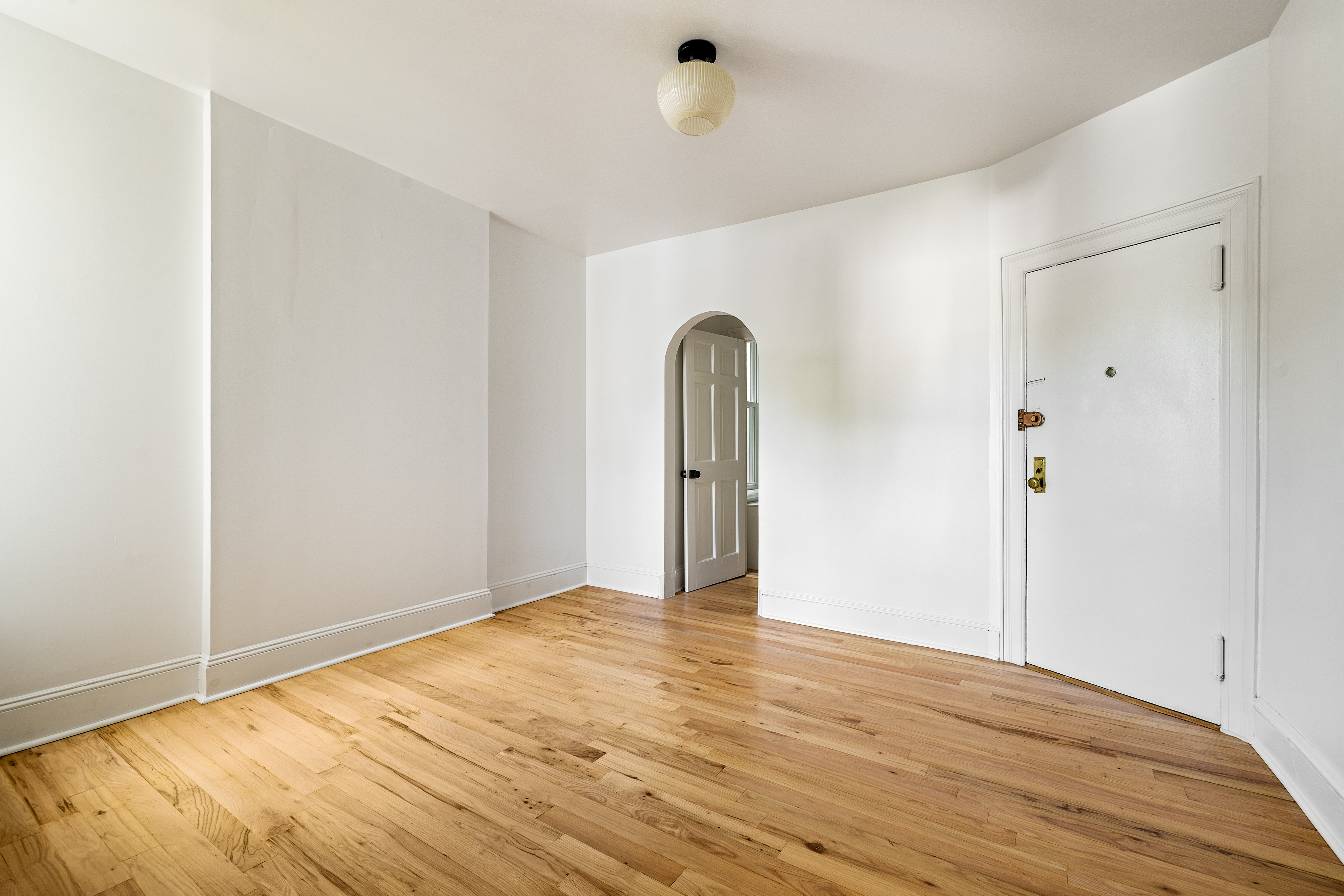456 Prospect Avenue, Unit 3R Brooklyn, NY 11215 - Photo 10 of 16 a view of an empty room with wooden floor