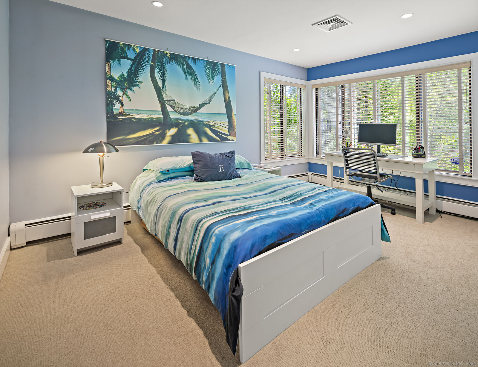 13 Bittersweet Road Weston, CT 06883 - Photo 19 of 35 a bedroom with a bed and a night stand