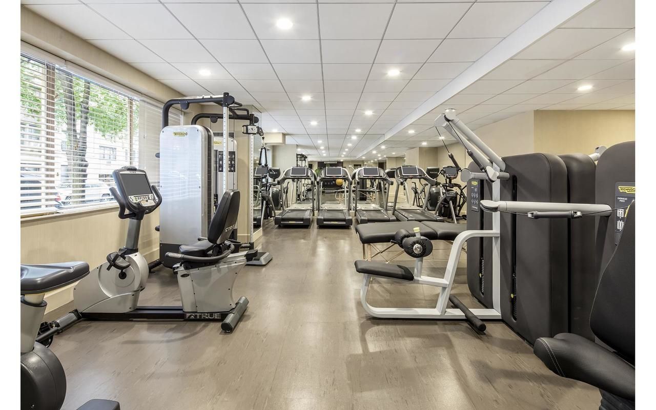200 East 69th Street, Unit 4N Manhattan, NY 10021 - Photo 8 of 13 a view of a room with gym equipment