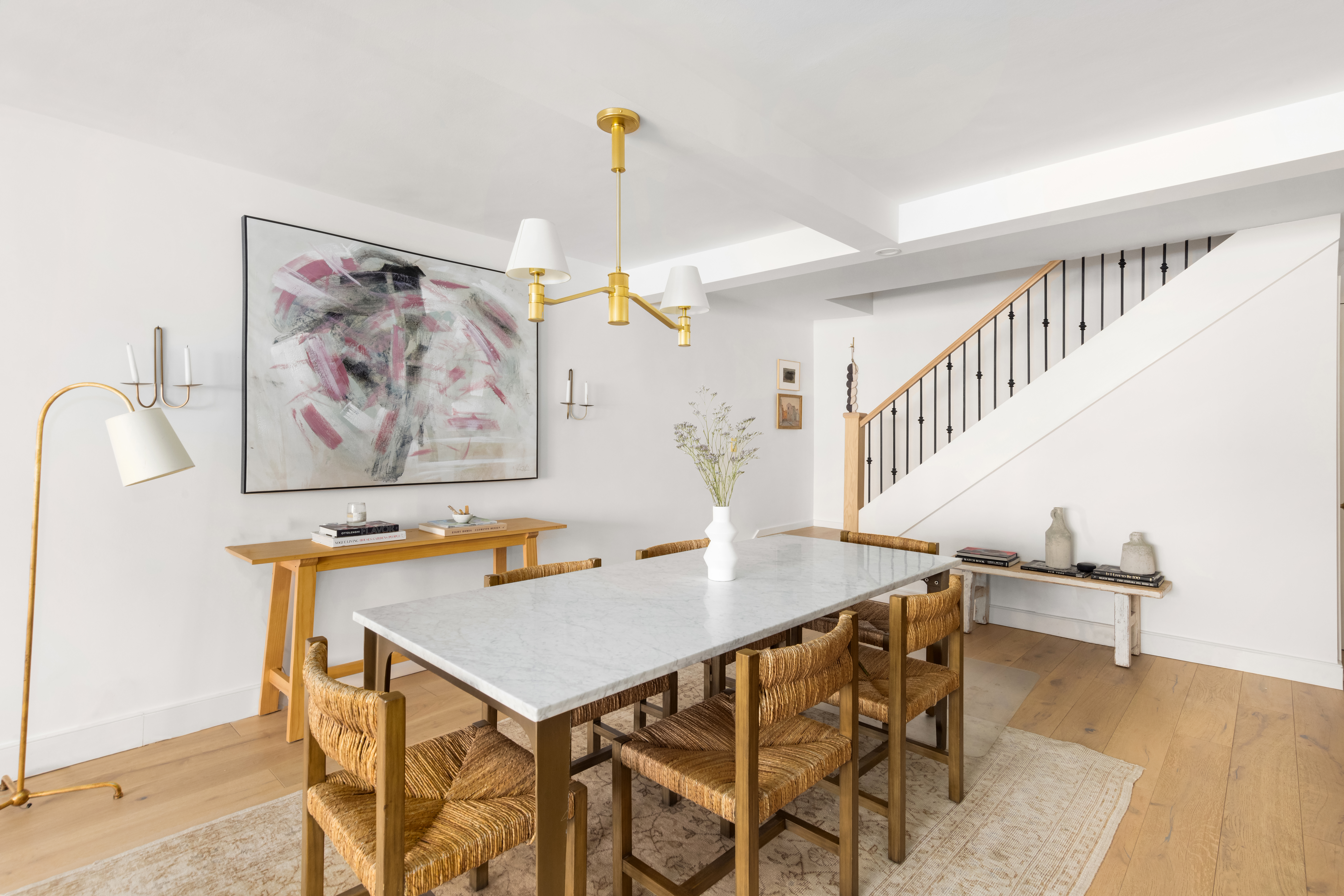 135 East 83rd Street, Unit 8/9C Manhattan, NY 10028 - Photo 3 of 15 a view of a dining room with furniture