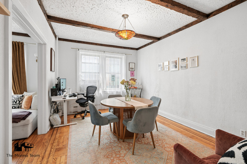 495 Lorimer Street Brooklyn, NY 11211 - Photo 4 of 24 a view of a dining room with furniture window and wooden floor