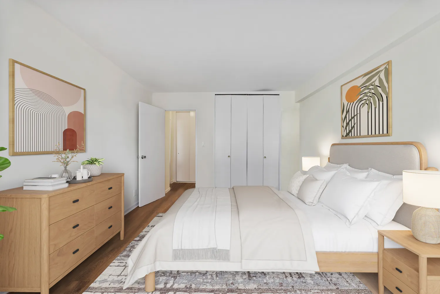 a bedroom with a bed and a dresser in it