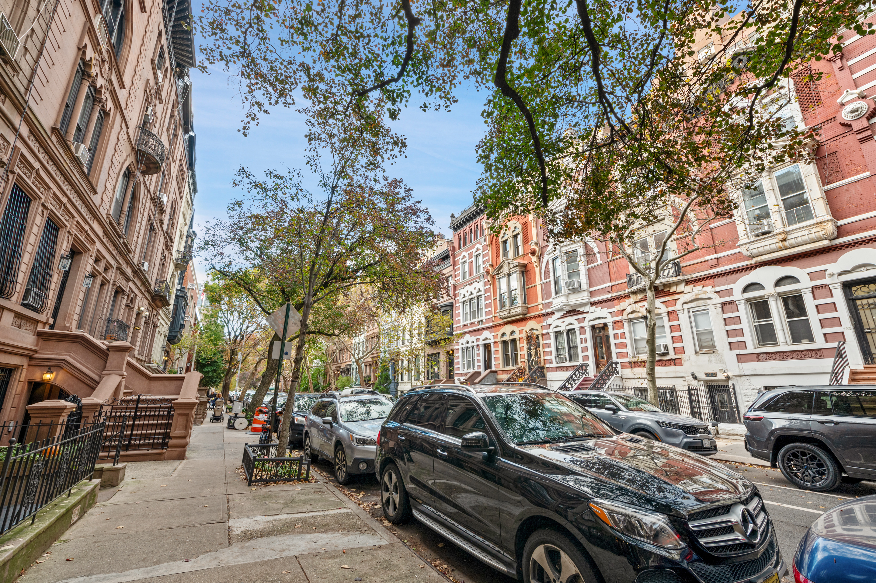 126 West 78th Street Manhattan, NY 10024 - Photo 31 of 39 a car parked in front of a brick house
