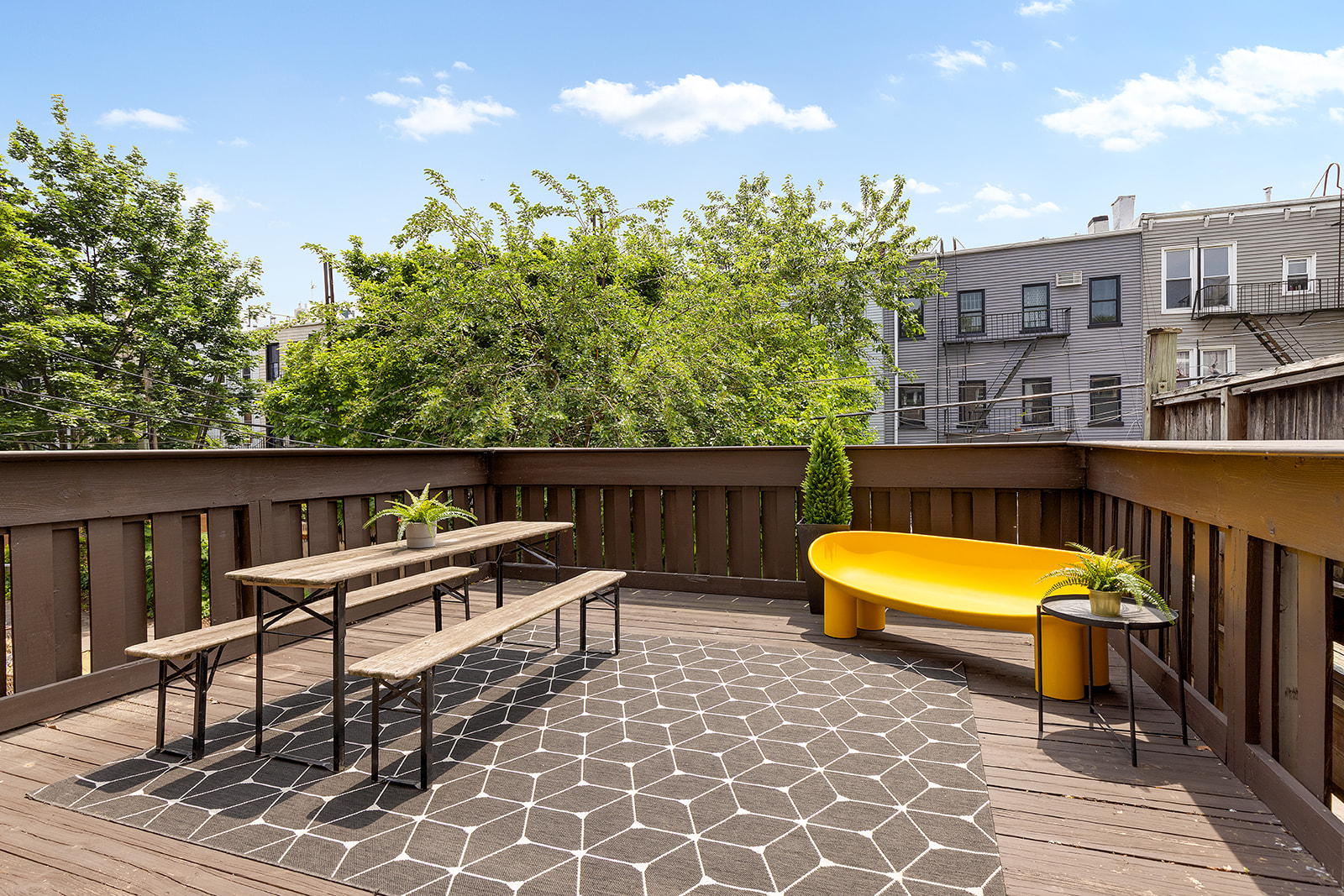 22 Sharon Street Brooklyn, NY 11211 - Photo 8 of 10 an outdoor view with a sitting space