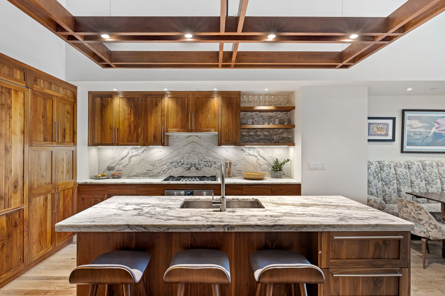 a kitchen with a table and chairs