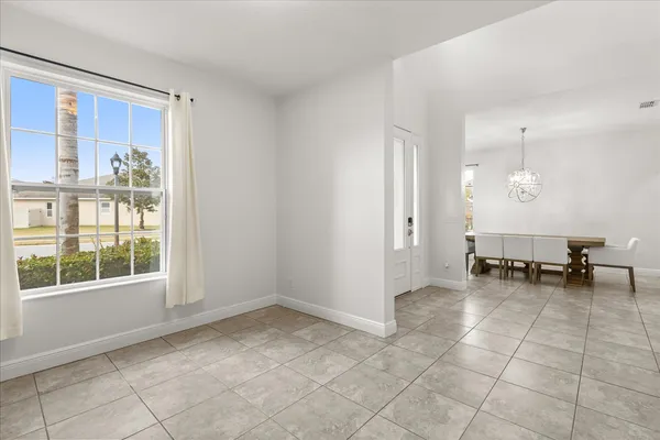a kitchen with granite countertop a sink and a stove