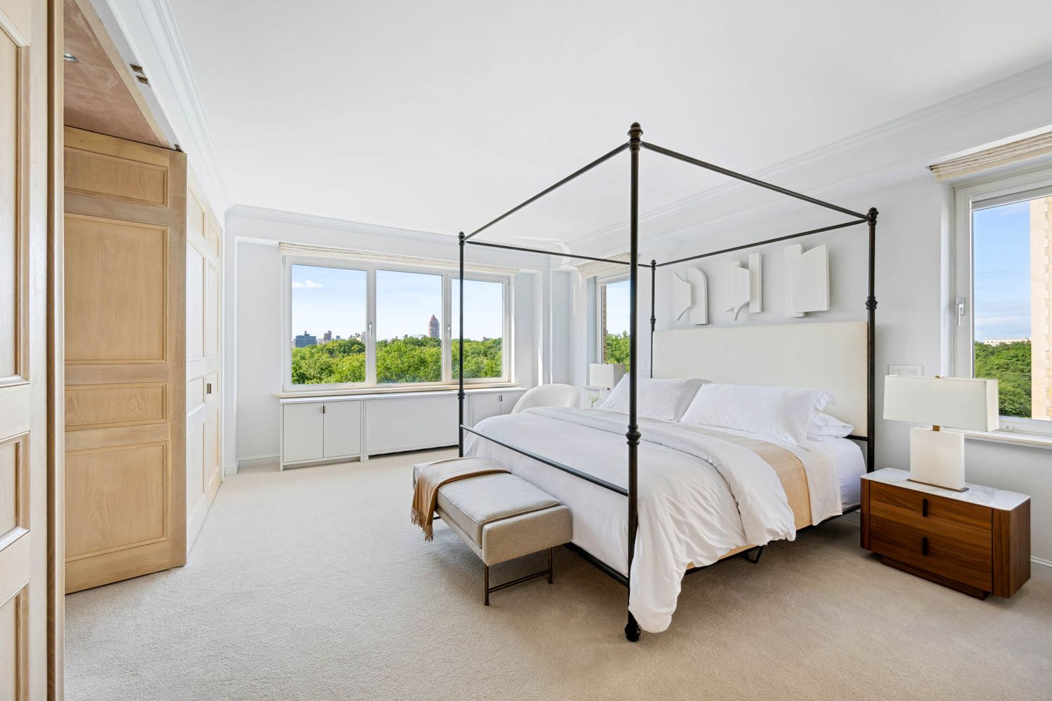 a bedroom with a bed and a shower