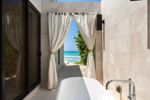 a view of balcony with furniture