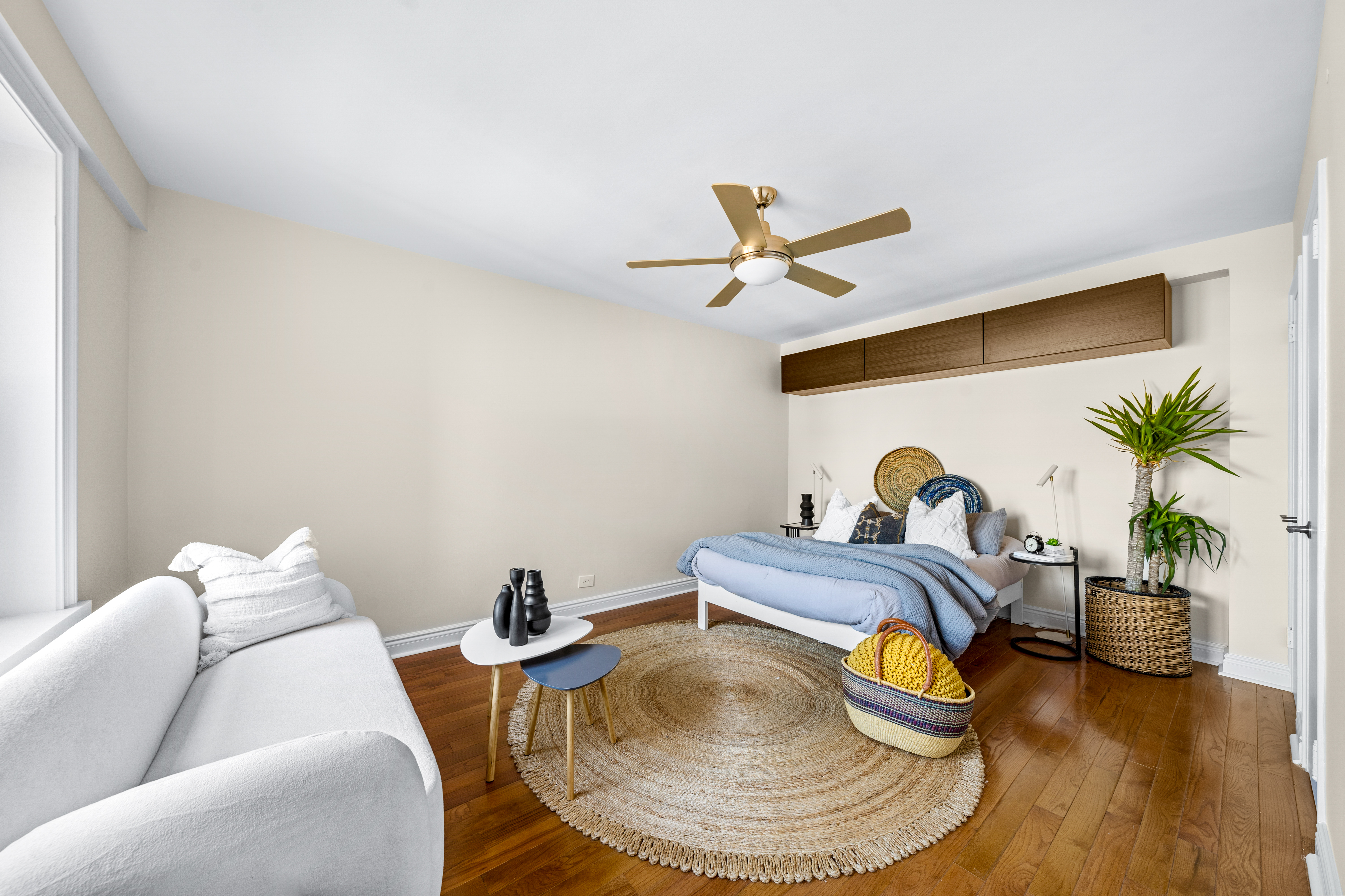 71-36 110th Street, Unit PH7E Queens, NY 11375 - Photo 12 of 16 a living room with furniture and a table