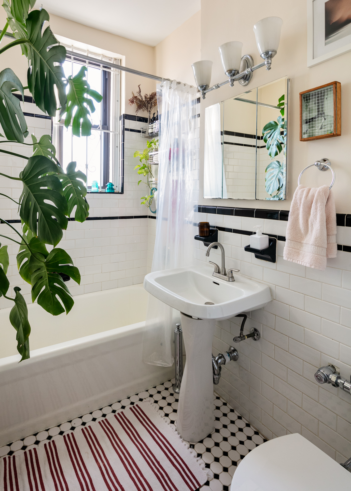 960 Sterling Place, Unit 5K Brooklyn, NY 11213 - Photo 6 of 7 a bathroom with a sink a toilet and shower