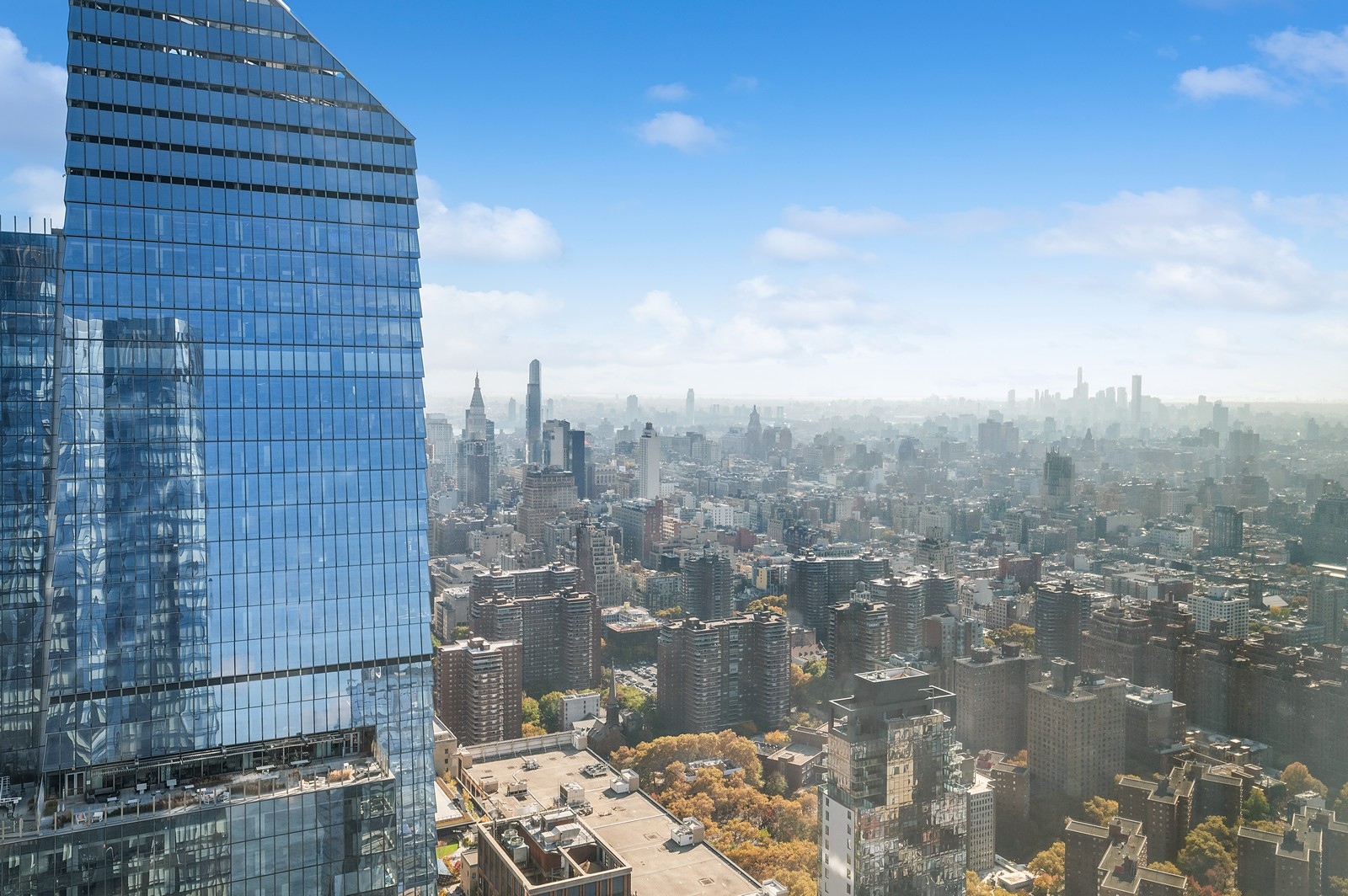 15 Hudson Yards, Unit 74F Manhattan, NY 10001 - Photo 11 of 13 a view of a city with tall buildings
