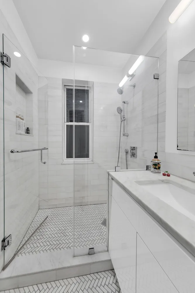 a bathroom with a sink and mirror