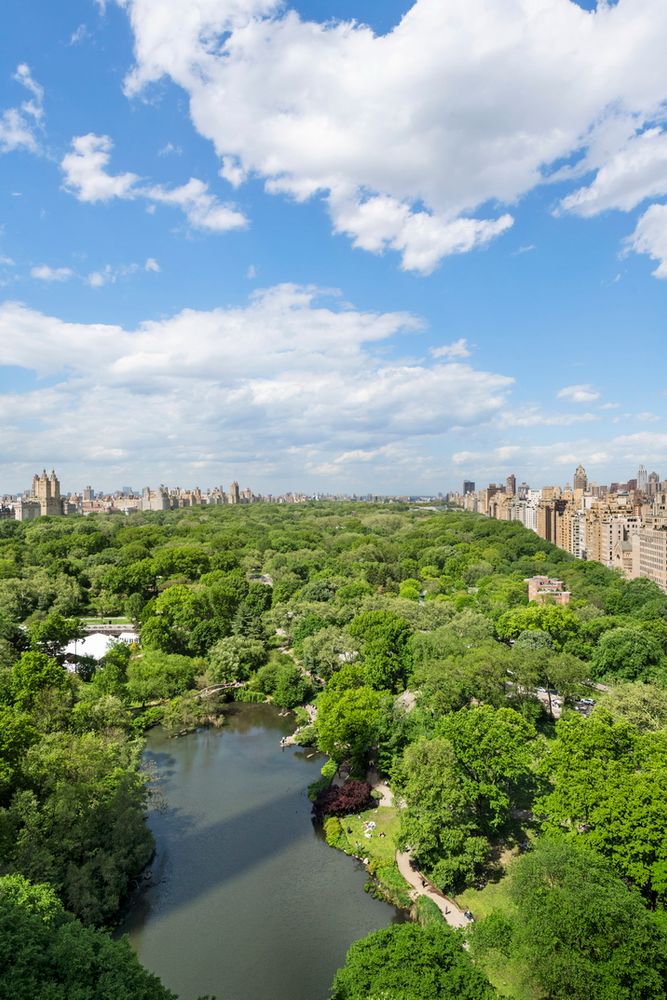 1 Central Park South, Unit 1801/1901 Manhattan, NY 10019 - Photo 7 of 21 a view of a garden with an outdoor seating