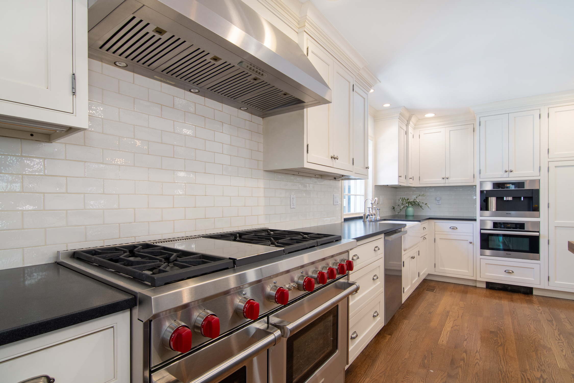 41 Harris Road Katonah, NY 10536 - Photo 6 of 48 a kitchen with stainless steel appliances granite countertop a stove and a sink