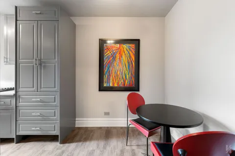 a workspace room with furniture