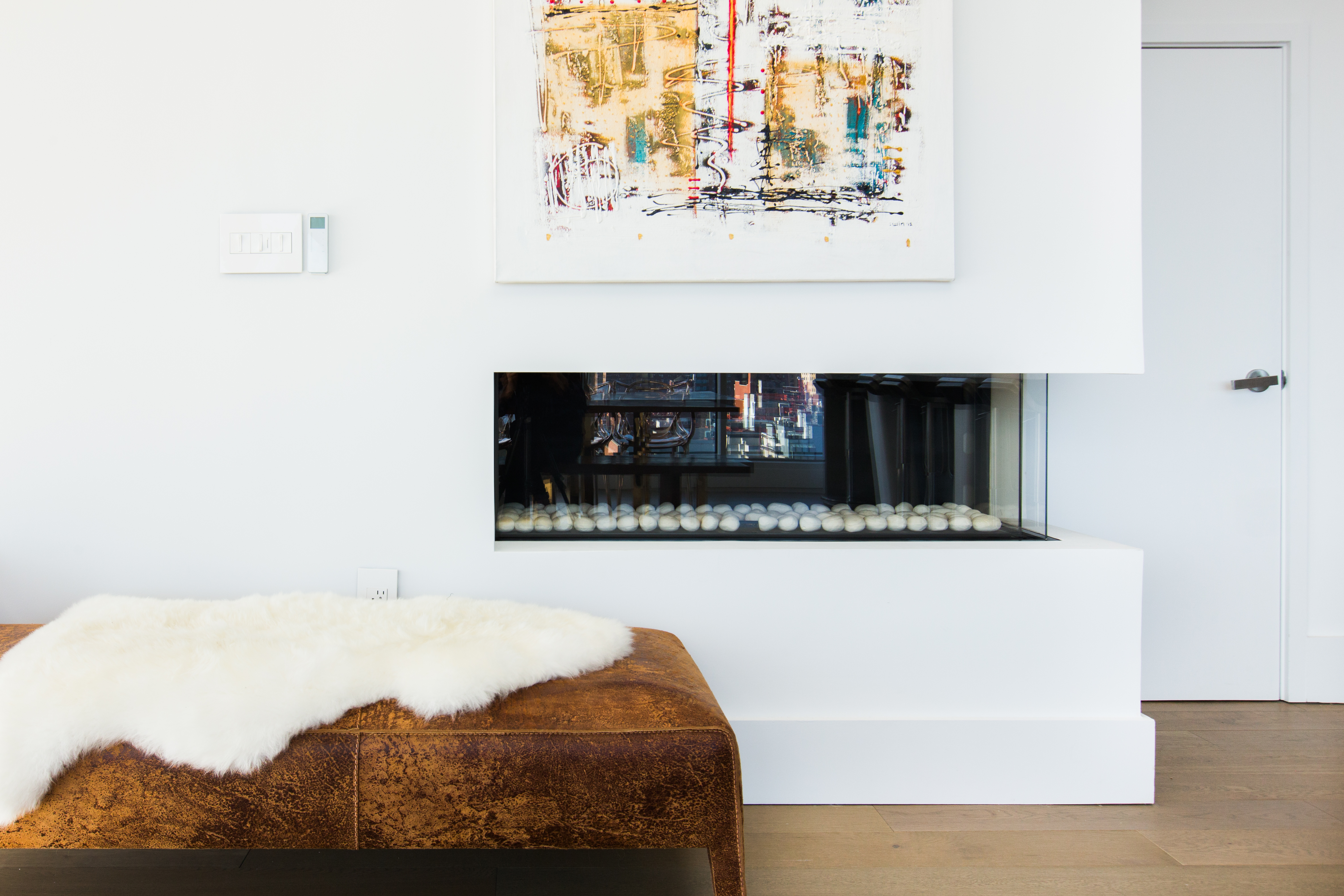 100 Norfolk Street, Unit PH Manhattan, NY 10002 - Photo 5 of 23 a living room with furniture and a fireplace
