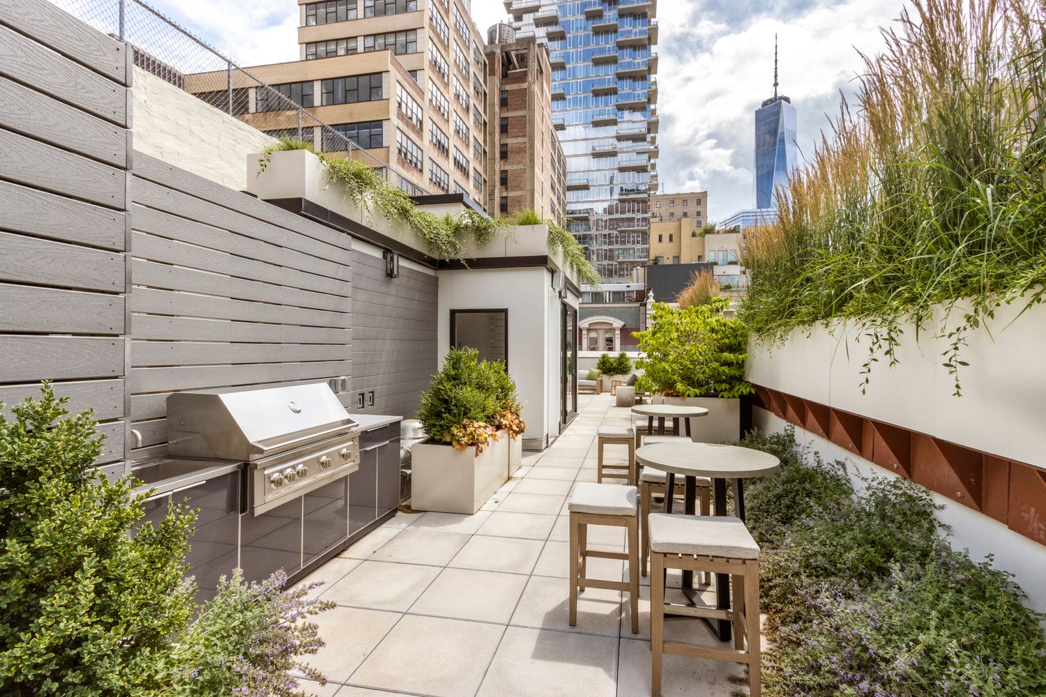 106 Franklin Street, Unit 2 Manhattan, NY 10013 - Photo 14 of 16 a view of a patio with couches and potted plants
