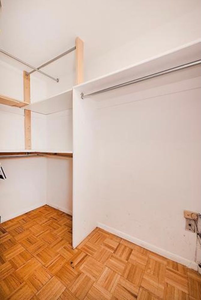 201 West 74th Street, Unit 16A Manhattan, NY 10023 - Photo 5 of 13 a view of a room with wooden floor